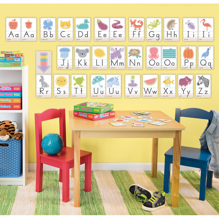 T19023 Good Nature Alphabet Cards displayed on the wall in a child's play space